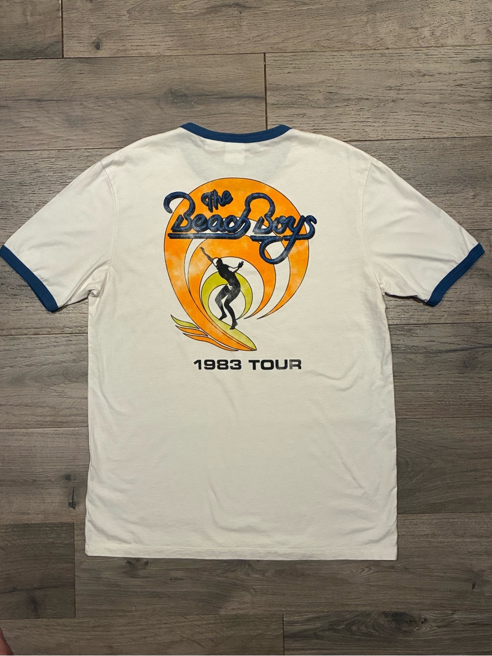Zara White Ringer Tee with Blue Trim & Orange Surf Graphic
